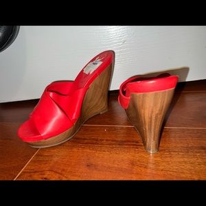 Red- orange Jessica Simpson slides, 4 inch wooden wedge heel.  7.5